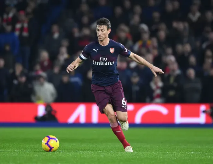Framed Print : Laurent Koscielny Focuses in Arsenal's Premier League Clash against Brighton & Hove Albion Framed Print : Laurent Koscielny Focuses in Arsenal's Premier League Clash against Brighton & Hove Albion