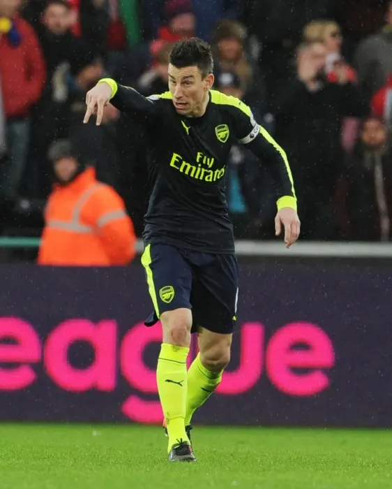 Framed Print : Laurent Koscielny Focuses in Swansea City vs Arsenal Premier League Clash