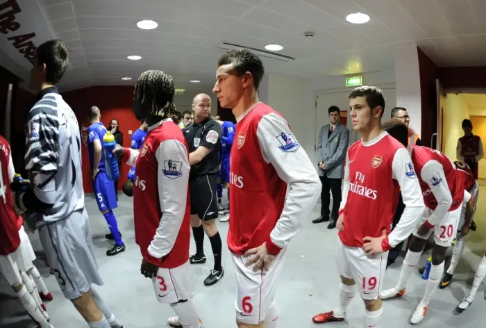 Framed Print : Laurent Koscielny and Jack Wilshere (Arsenal) wait to walk up the tunnel before the match