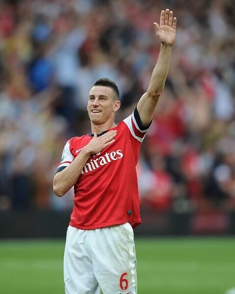 Laurent Koscielny's Emotional Victory Celebration: Arsenal's Triumph Over Tottenham (2013-14)