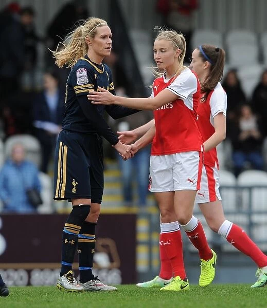 Leah Williamson and Wendy Martin: A Sportsmanlike Handshake After Arsenal Ladies vs. Tottenham Hotspur Ladies FA Cup Match