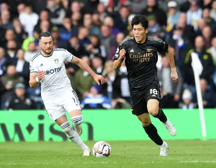 Framed Print : Leeds United vs. Arsenal: Intense Battle – Tomiyasu Under Pressure