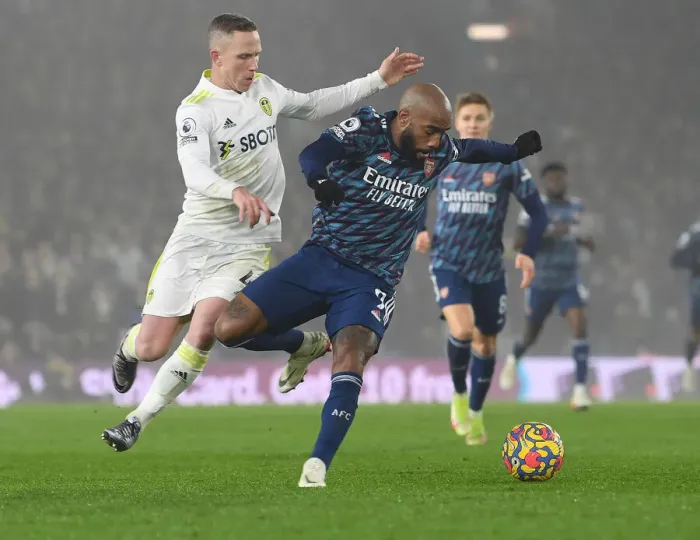 Framed Print : Leeds United vs. Arsenal: Lacazette Clashes with Forshaw in Premier League Showdown