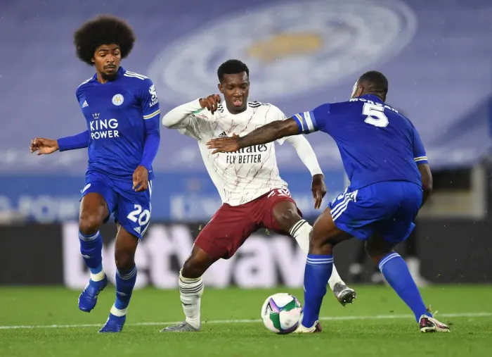 Framed Print : Leicester City vs. Arsenal: Eddie Nketiah Clashes with Hamza Choudhury and Wes Morgan in Carabao Cup Showdown