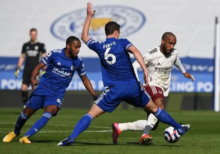 Framed Print : Leicester City vs Arsenal: Lacazette Takes on Evans and Pereira in Intense Premier League Clash Framed Print : Leicester City vs Arsenal: Lacazette Takes on Evans and Pereira in Intense Premier League Clash