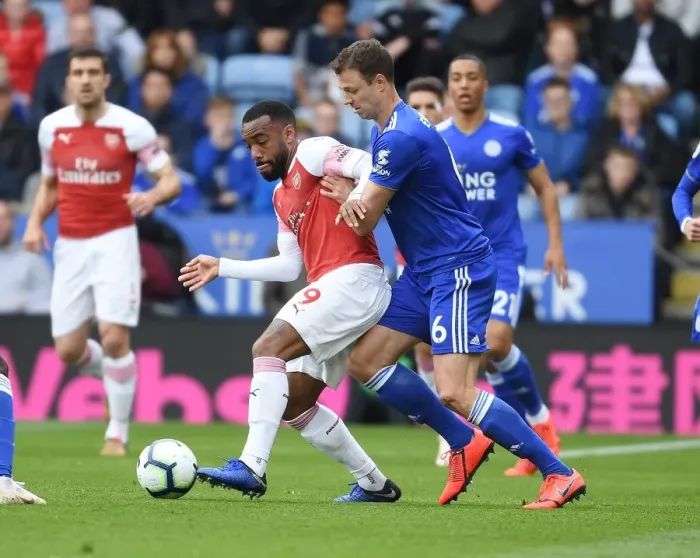Framed Print : Leicester City vs. Arsenal: Lacazette vs. Evans Clash in Premier League Showdown Framed Print : Leicester City vs. Arsenal: Lacazette vs. Evans Clash in Premier League Showdown