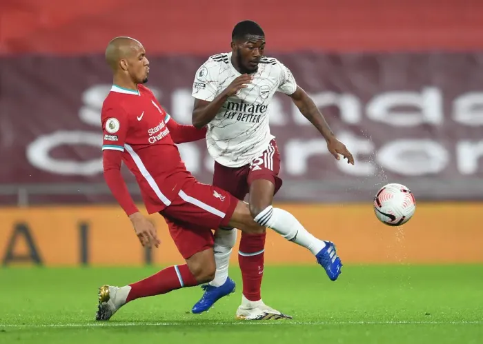 Framed Print : Liverpool vs Arsenal: Ainsley Maitland-Niles vs Fabinho Clash in Empty Anfield (Premier League 2020-21) Framed Print : Liverpool vs Arsenal: Ainsley Maitland-Niles vs Fabinho Clash in Empty Anfield (Premier League 2020-21)
