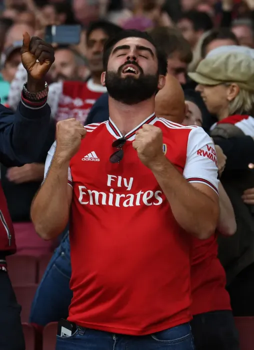 Framed Print : London Derby: Arsenal vs. Tottenham - Passionate Arsenal Fan at Emirates Stadium, Premier League 2021-22