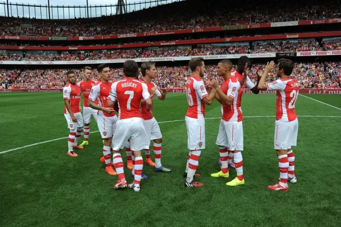 Framed Print : LONDON, ENGLAND - AUGUST 02: The Arsenal team line up before the match between Arsenal