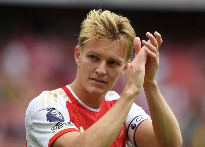 Framed Print : LONDON, ENGLAND - AUGUST 12: Martin Oedegaard of Arsenal applauds the fans after the team's victory in the Premier League match between Arsenal FC and Nottingham Forest at Emirates Stadium on August 12, 2023 in London, England