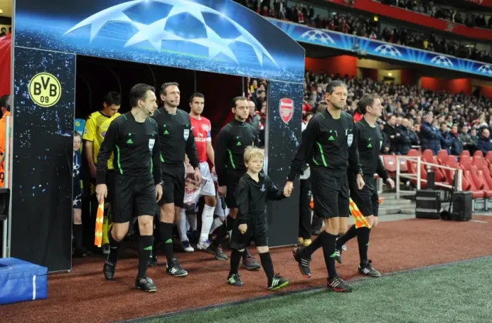 Framed Print : LONDON, ENGLAND - NOVEMBER 23: Officials before the UEFA Champions League Group F match between Arsenal FC and Borussia Dortmund at Emirates Stadium on November 23, 2011 in London, England. (Photo by David Price  /  Arsenal FC via