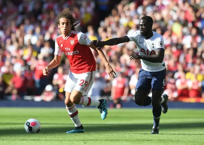 Framed Print : London Rivalry: Guendouzi vs. Sanchez - Arsenal vs. Tottenham Showdown (2019-20)