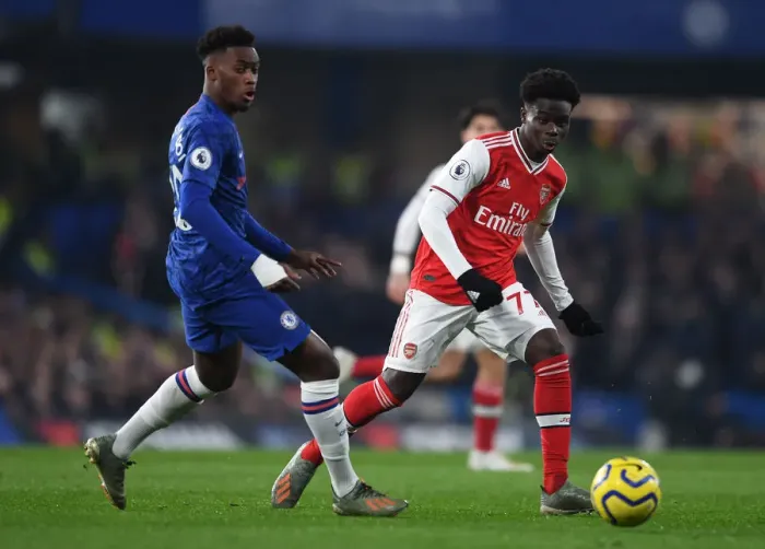Framed Print : London Rivals Clash: Saka vs. Hudson-Odoi - Premier League Showdown at Stamford Bridge Framed Print : London Rivals Clash: Saka vs. Hudson-Odoi - Premier League Showdown at Stamford Bridge