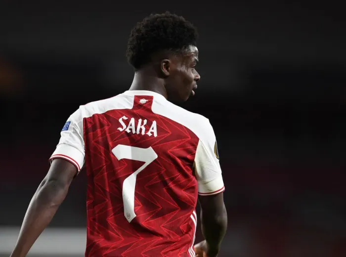 Framed Print : Lone Warrior: Bukayo Saka's Europa League Battle at Empty Emirates