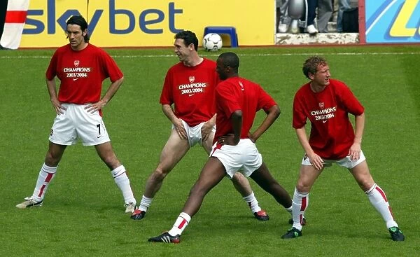 (L>R) Robert Pires, Martin Keown, Patrick Vieira and Ray Parlour (ARsenal) warm up before the match