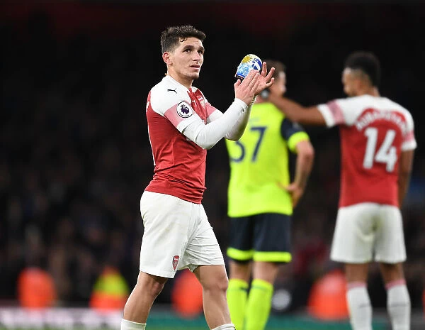 Lucas Torreira Celebrates with Arsenal Fans after Arsenal v Huddersfield Town Match