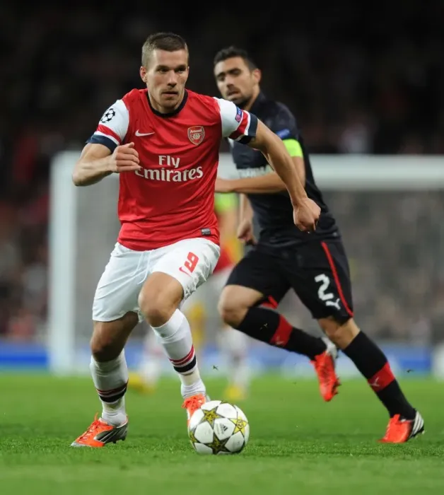 Framed Print : Lukas Podolski in Action: Arsenal vs. Olympiacos, UEFA Champions League 2012-13