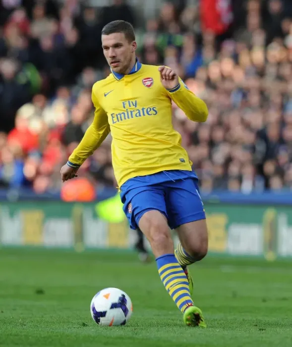 Framed Print : Lukas Podolski in Action: Arsenal vs. Stoke City, Premier League 2013-14