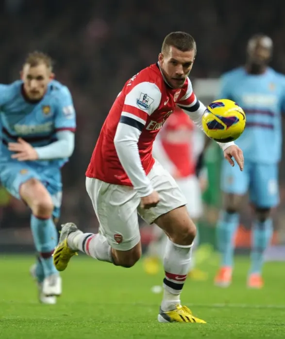 Framed Print : Lukas Podolski in Action: Arsenal vs West Ham United, Premier League 2012-13