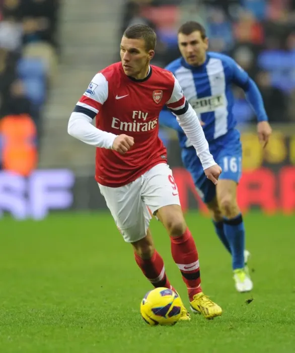Framed Print : Lukas Podolski in Action: Wigan Athletic vs. Arsenal, Premier League 2012-13