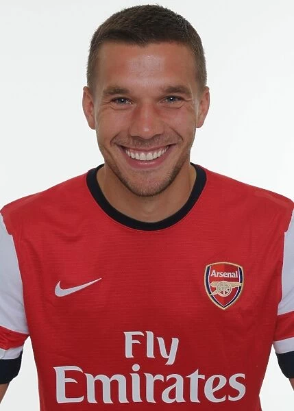 Lukas Podolski at Arsenal 2013-14 Squad Team Photocall