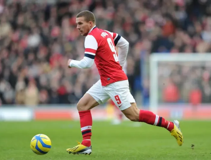 Framed Print : Lukas Podolski (Arsenal). Brighton & Hove Albion 2: 3 Arsenal. FA Cup 4th Round. The AMEX Stadium