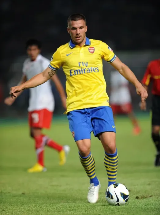 Framed Print : Lukas Podolski: Arsenal Star Shines in Indonesia All-Stars Match, 2013