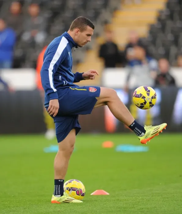 Framed Print : Lukas Podolski: Arsenal Star's Pre-Match Focus at Swansea (2014-15) Framed Print : Lukas Podolski: Arsenal Star's Pre-Match Focus at Swansea (2014-15)