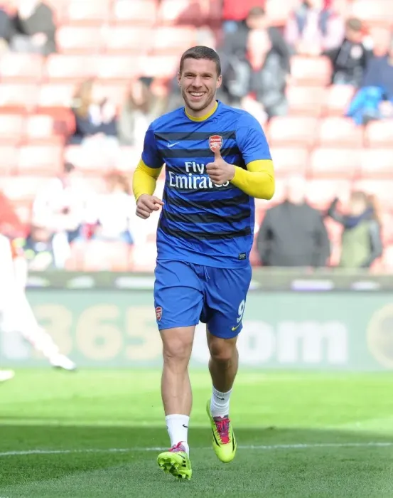 Framed Print : Lukas Podolski (Arsenal). Stoke City 1: 0 Arsenal. Barclays Premier League. The Britainna Stadium