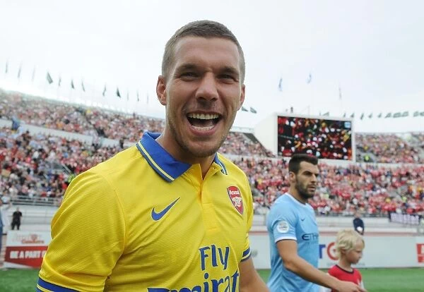 Lukas Podolski: Arsenal's Star Forward Prepares for Manchester City Clash in Helsinki (2013)