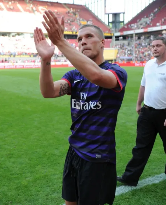 Framed Print : Lukas Podolski Bids Farewell: Arsenal Star Waves to Cologne Fans after Pre-Season Friendly Framed Print : Lukas Podolski Bids Farewell: Arsenal Star Waves to Cologne Fans after Pre-Season Friendly