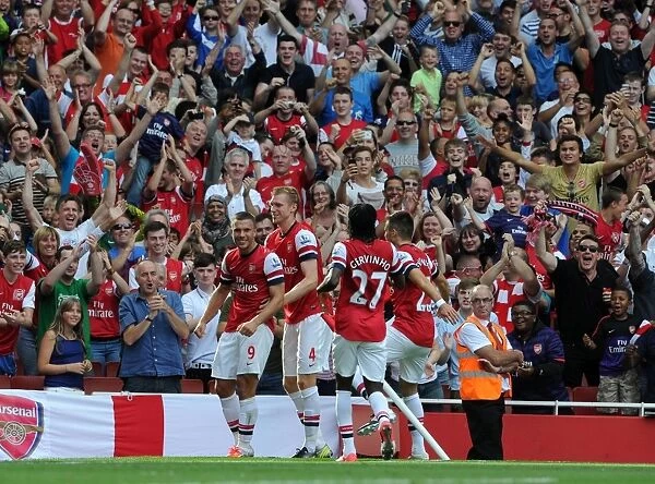 Lukas Podolski celebrates scoring the 2nd Arsenal goal. Arsenal 6: 1 Southampton