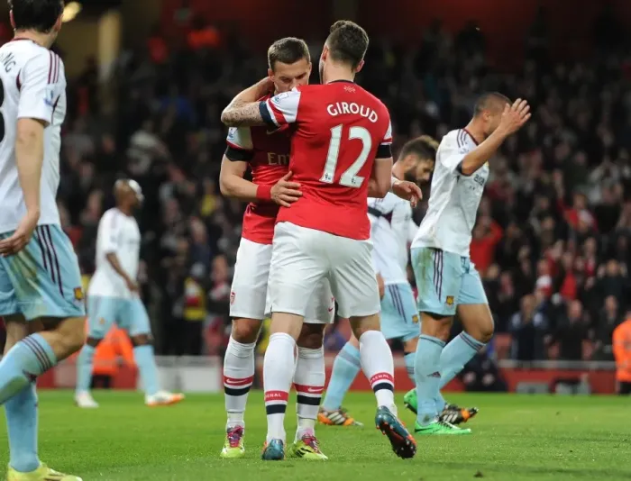 Framed Print : Lukas Podolski celebrates scoring his and Arsenals 1st goal with Olivier Giroud