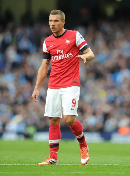 Framed Print : Lukas Podolski Faces Manchester City: Premier League Showdown (2012-13) Framed Print : Lukas Podolski Faces Manchester City: Premier League Showdown (2012-13)