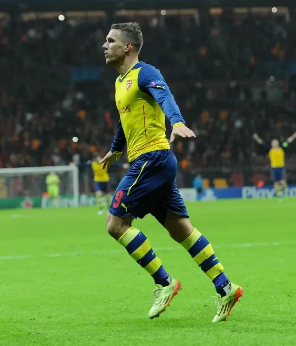 Framed Print : Lukas Podolski Scores Double: Arsenal's Victory Over Galatasaray in UEFA Champions League, Istanbul 2014
