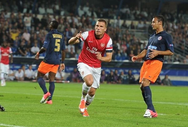 Lukas Podolski Scores First Arsenal Goal in Montpellier Victory, 2012-13 UEFA Champions League