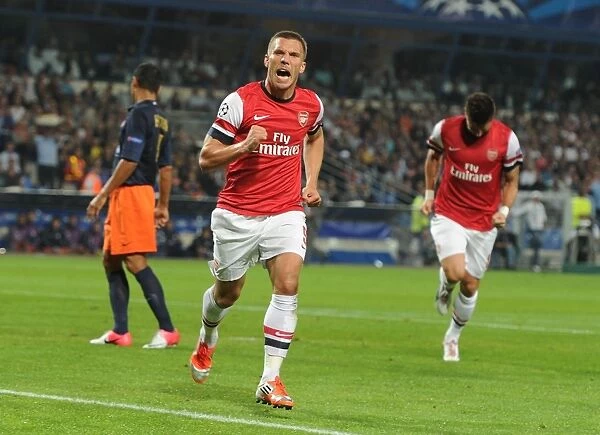 Lukas Podolski Scores First Arsenal Goal in UEFA Champions League Victory over Montpellier (September 2012)