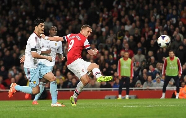 Lukas Podolski Scores Third Goal Past James Tomkins in Arsenal's Victory over West Ham United