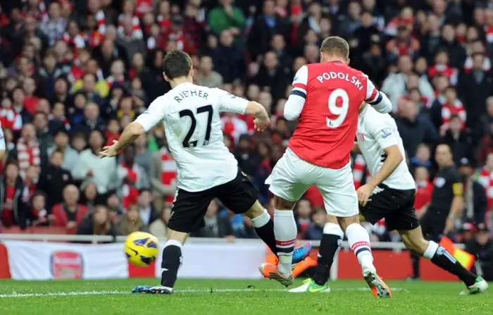 Framed Print : Lukas Podolski Scores Against Sascha Riether: Arsenal vs Fulham, Premier League 2012-13 Framed Print : Lukas Podolski Scores Against Sascha Riether: Arsenal vs Fulham, Premier League 2012-13