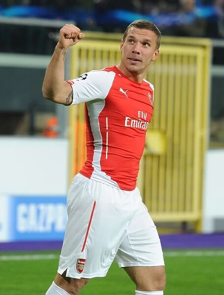 Lukas Podolski Scores the Second Goal: Arsenal's Victory over Anderlecht in the 2014-15 UEFA Champions League