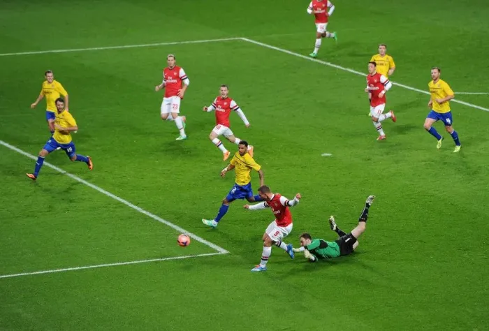 Framed Print : Lukas Podolski Scores Stunner Past Joe Murphy in Arsenal's FA Cup Victory