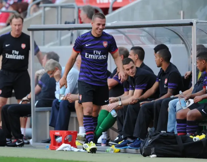 Framed Print : Lukas Podolski Shares a Joke with Arsenal Bench During Cologne Friendly, 2012 Framed Print : Lukas Podolski Shares a Joke with Arsenal Bench During Cologne Friendly, 2012