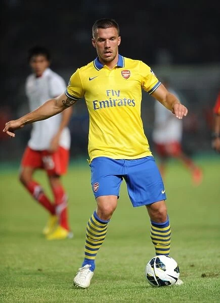 Lukas Podolski Shines in Arsenal's Victory against Indonesia All-Stars, 2013