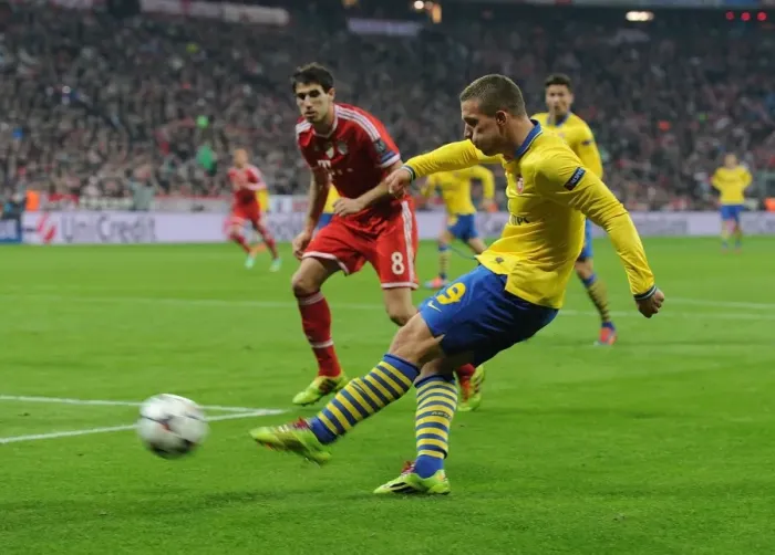 Framed Print : Lukas Podolski Stuns Bayern Munich: Dramatic Goal in Champions League Showdown Framed Print : Lukas Podolski Stuns Bayern Munich: Dramatic Goal in Champions League Showdown