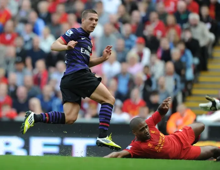 Framed Print : Lukas Podolski Stuns Liverpool: Arsenal's Historic First Goal at Anfield, 2012-13 Premier League