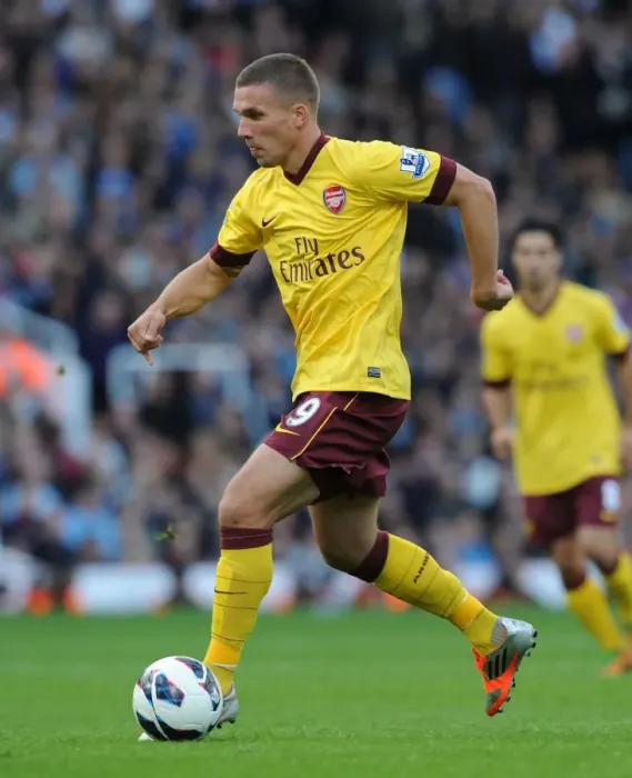 Framed Print : Lukas Podolski: Thriving in Action for Arsenal vs. West Ham United, Premier League 2012-13