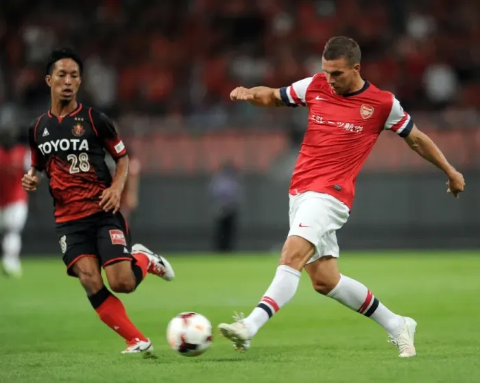Framed Print : Lukas Podolski vs. Taishi Taguchi: Nagoya Grampus vs. Arsenal, 2013