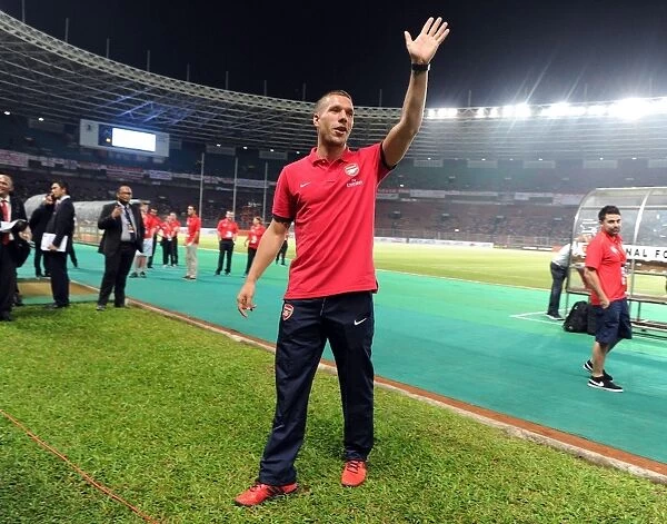 Lukas Podolski Waves to Arsenal Fans in Indonesia (2013-14)