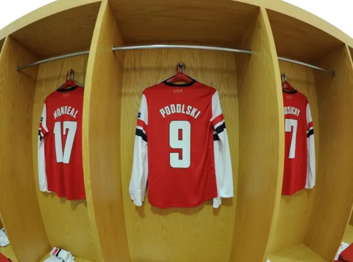 Framed Print : Lukas Podolski's Arsenal Jersey on Display: Arsenal FC vs. FC Bayern Munchen, UEFA Champions League Round of 16 Framed Print : Lukas Podolski's Arsenal Jersey on Display: Arsenal FC vs. FC Bayern Munchen, UEFA Champions League Round of 16