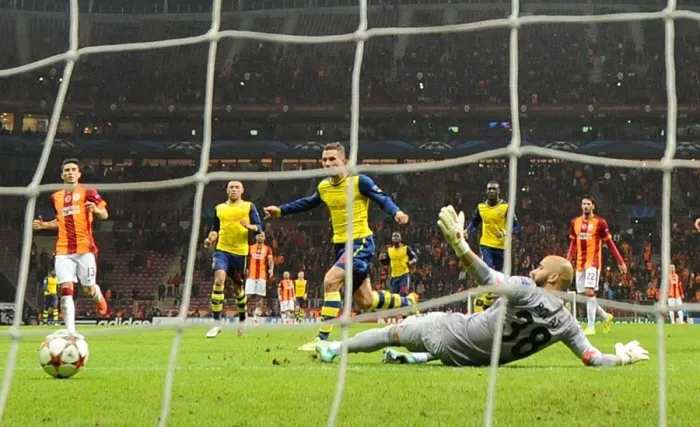 Framed Print : Lukas Podolski's Double Strike: Arsenal's Victory Over Galatasaray in UEFA Champions League (2014 / 15)